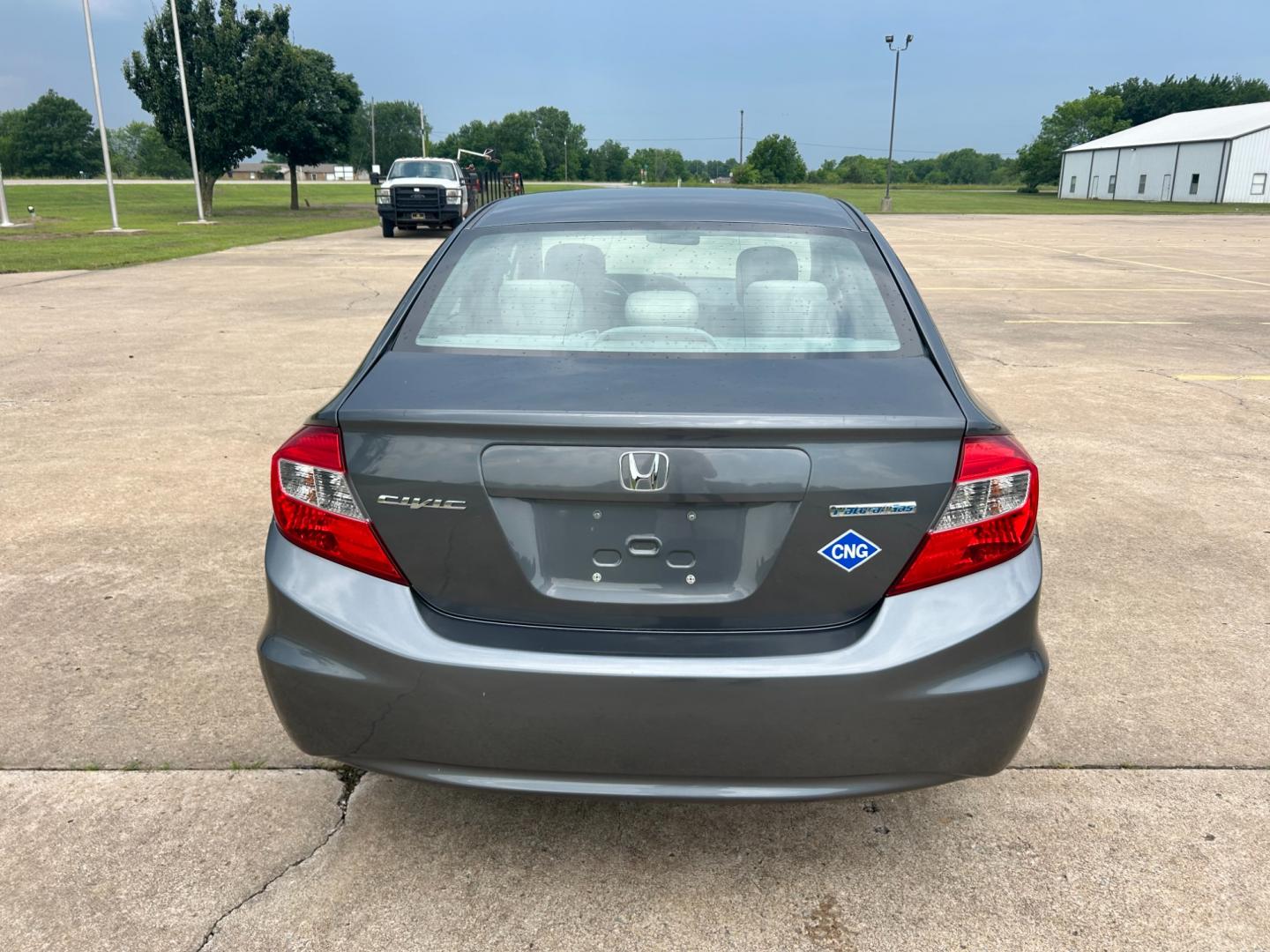 2012 GRAY /Gray Honda Civic CNG Sedan 5-Speed AT (19XFB5F56CE) with an 1.8L L4 SOHC 16V CNG engine, 5-Speed Automatic transmission, located at 17760 Hwy 62, Morris, OK, 74445, (918) 733-4887, 35.609104, -95.877060 - Photo#5